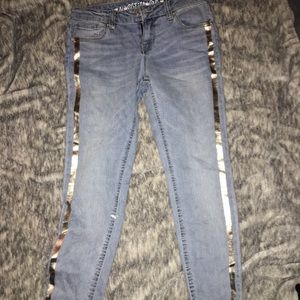 Blue jeans with silver strip on the side